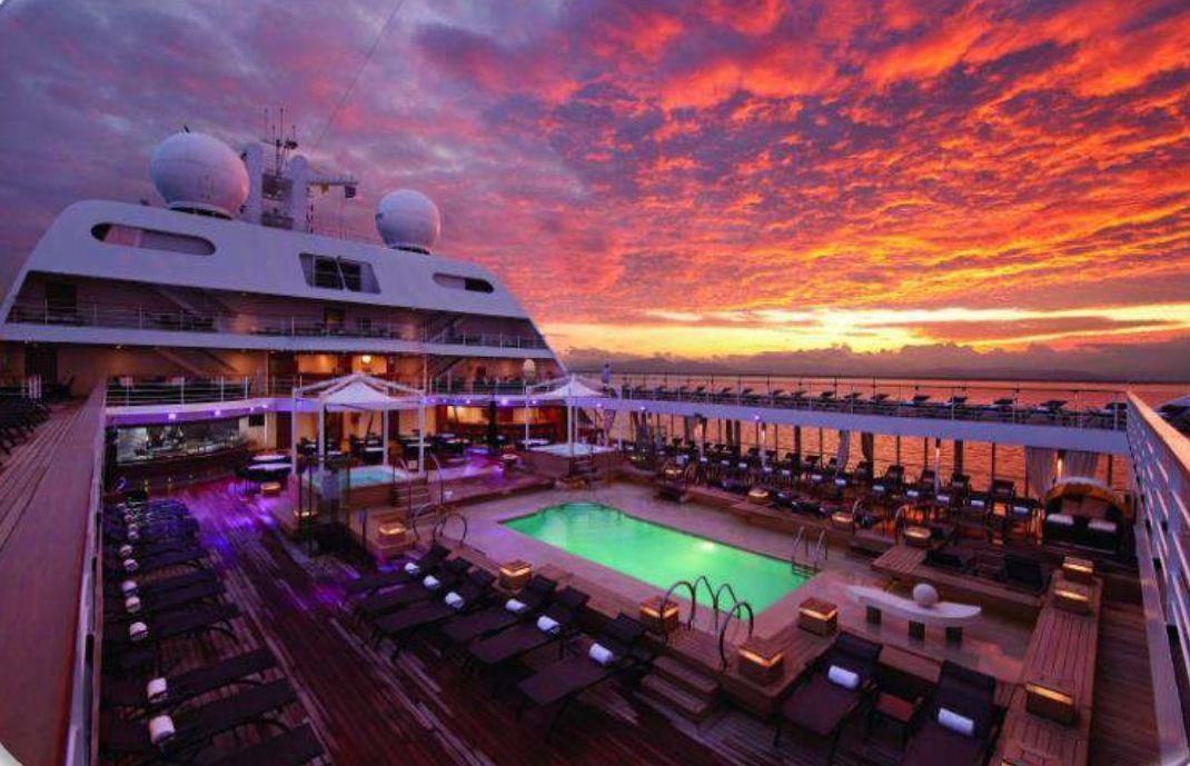 Cruise ship pool deck at sunset